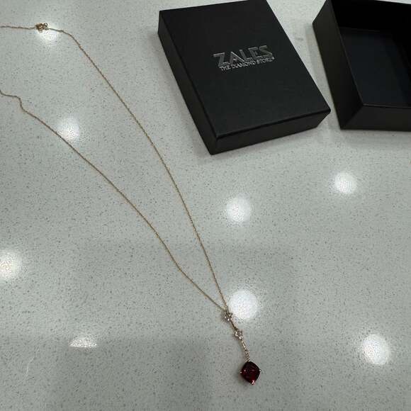 Zales 10K Gold Garnet Necklace with Diamond Accents - Picture 2 of 2